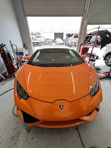 Orange Lamborghini repair