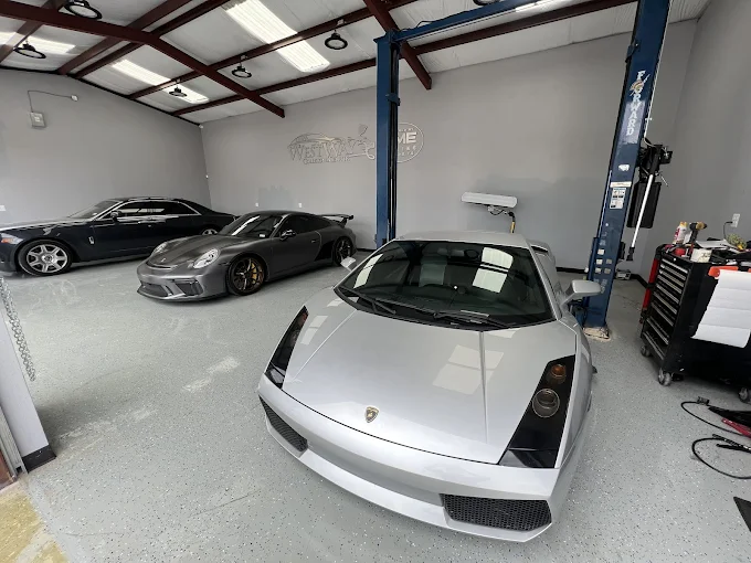 Multiple cars in repair shop